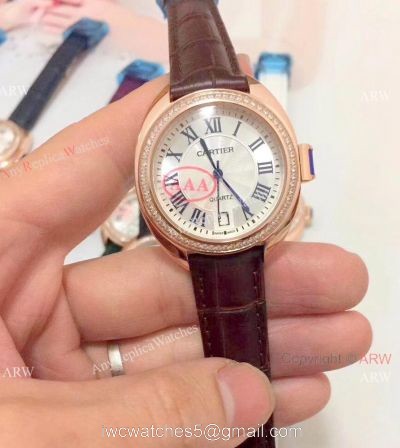 Fake Cle de Cartier Roman Dial Rose Gold Diamond watch Women Size 1