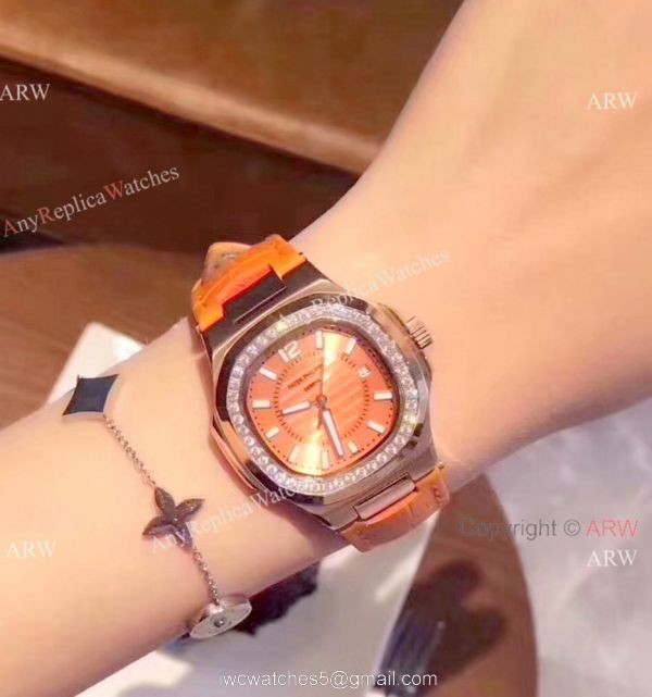 Copy Patek Philippe Nautilus Womens Watch Diamond Bezel Orange Watch 1