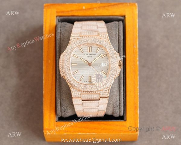 Swiss AAA Replica Patek Philippe Nautilus 9015 Ultra-thin Watch Rose Gold Iced Out Black Dial 40mm 1