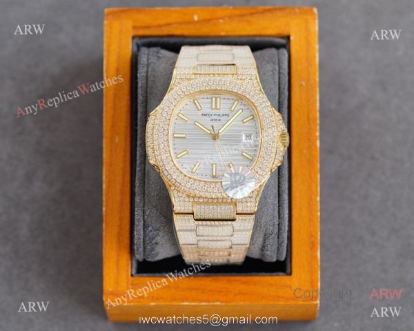 Swiss AAA Replica Patek Philippe Nautilus Iced Out Yellow Gold Watch 40mm 9015 Ultra-thin Movement 1