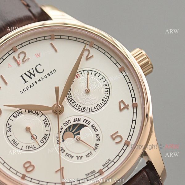 Replica IWC Portuguese Moonphase Gold Case White Face Watch 3
