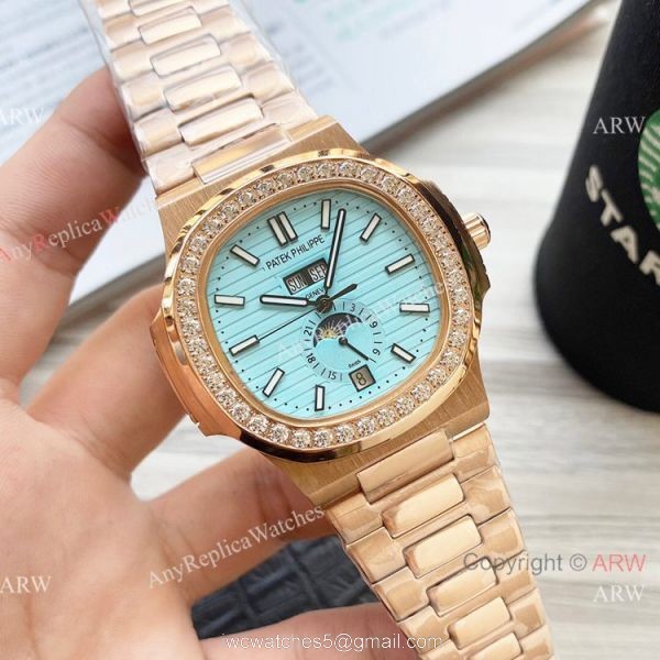 New Clone Patek Philippe Nautilus Annual Calendar Watch Baby Blue Face with Diamonds 3