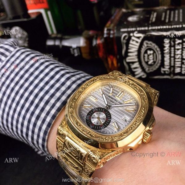 New Fake Patek Philippe Engraving Nautilus Silver Face Yellow Gold Watch For Sale 4