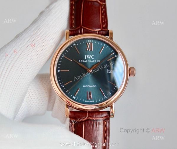 High Quality IWC Portofino Rose Gold Blue Dial Automatic Replica Watch 4