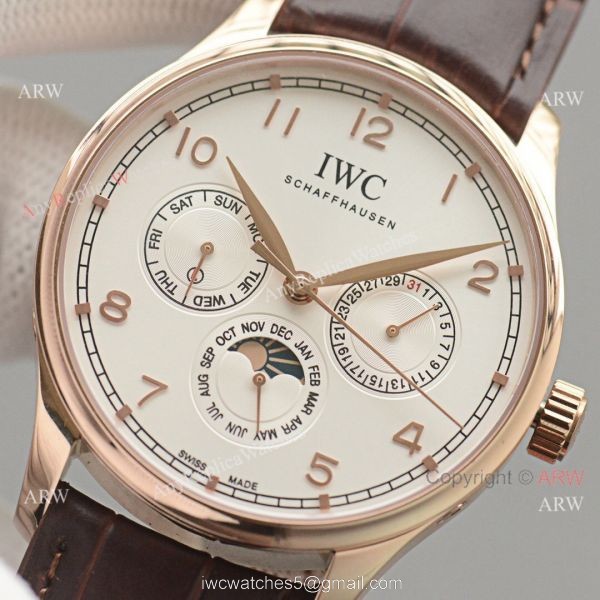 Replica IWC Portuguese Moonphase Gold Case White Face Watch 4