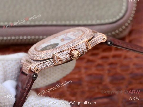 Swiss Replica Patek Philippe Nautilus Jumbo R8 Watch Rose Gold Iced Out 5