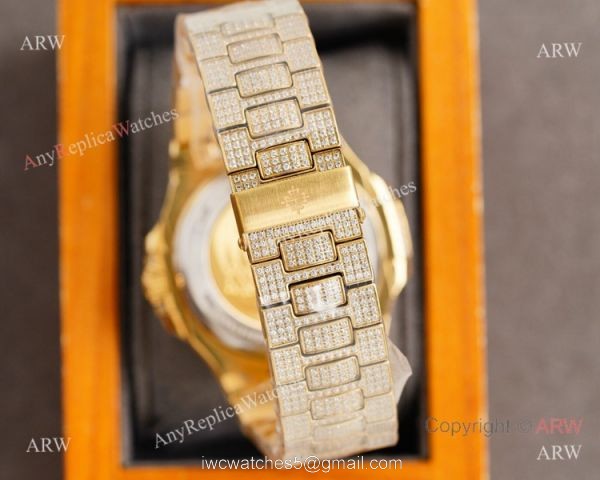 Swiss Grade Copy Patek Philippe Nautilus 9015 Ultra thin Watch 40 Diamond Dial All Gold 5