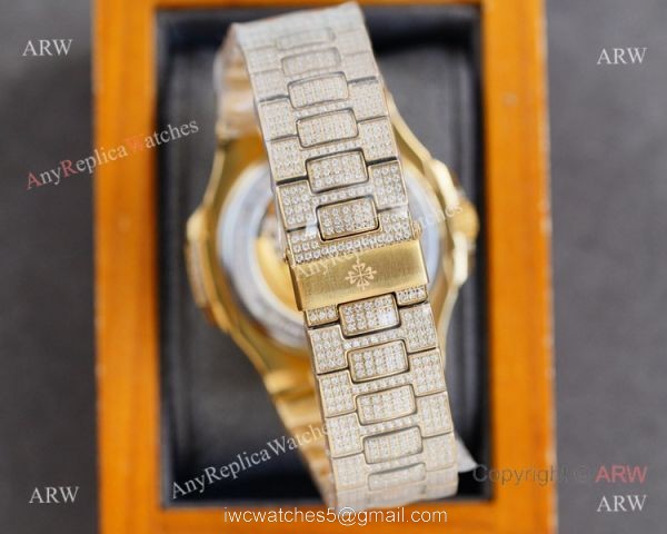 Swiss AAA Replica Patek Philippe Nautilus Iced Out Yellow Gold Watch 40mm 9015 Ultra-thin Movement 5