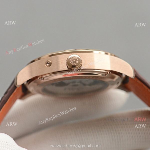 Replica IWC Portuguese Moonphase Gold Case White Face Watch 5