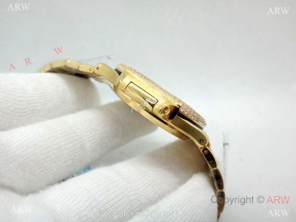 Swiss Replica Patek Philippe Nautilus Jumbo Gold Iced Out Watch 39.5mm 6