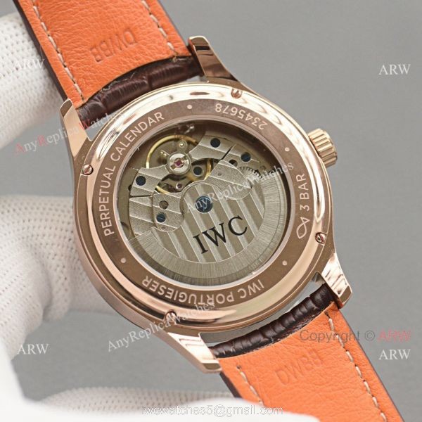 Replica IWC Portuguese Moonphase Gold Case White Face Watch 6