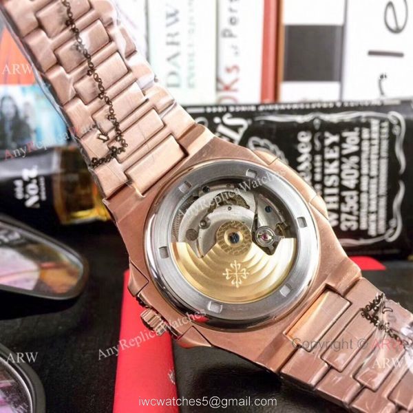 Clone Patek Philippe Nautilus White Face Rose Gold Tattoo Watch 40mm 7