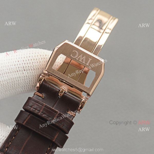 Replica IWC Portuguese Moonphase Gold Case White Face Watch 7