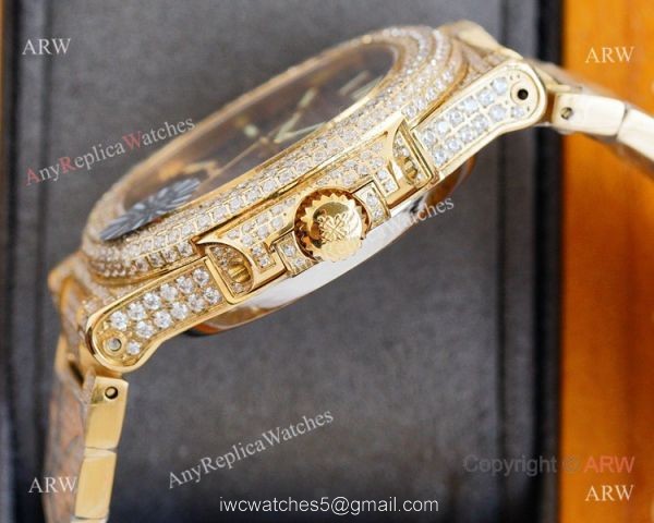 Swiss AAA Replica Patek Philippe Nautilus Iced Out Yellow Gold Watch 40mm 9015 Ultra-thin Movement 7