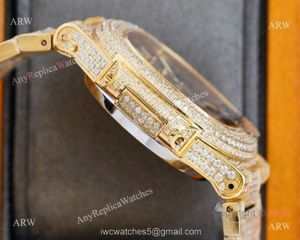 Swiss AAA Replica Patek Philippe Nautilus Iced Out Yellow Gold Watch 40mm 9015 Ultra-thin Movement 8